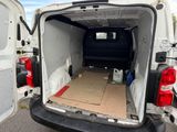 a white van with a box in the back of it