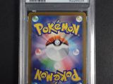 a close up of a pokemon card in a plastic case