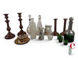 a lot of glass vases that are sitting on a table