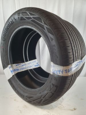 a close up of a tire with a tape around it