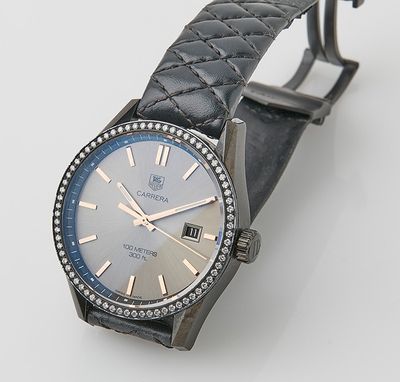 an image of a wrist watch with a diamond bezeled bezel