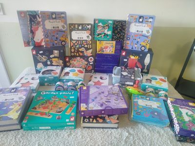a lot of books that are on the table
