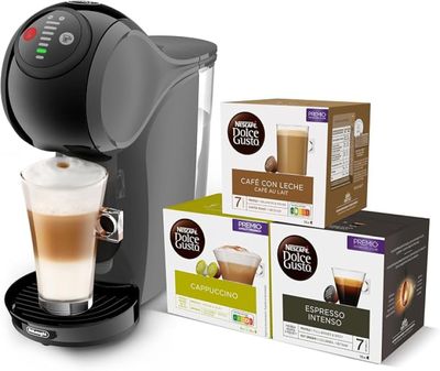 a close up of a cup of coffee next to three boxes of coffee