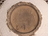 a white hat with writing on it that says jesus belongs france