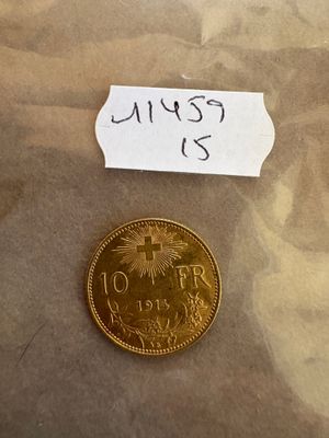 un petit bout de papier sur lequel est représentée une pièce d'or