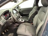 the interior of a car with a steering wheel and dashboard controls