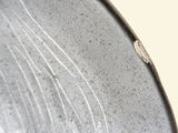 an image of a close up of a metal plate