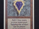 an image of a card with a purple diamond on it