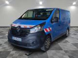 the blue van is parked on a checkered floor in the garage