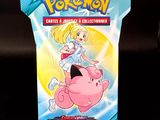 un gros plan sur une boîte de cartes Pokémon représentant une fillette chevauchant un cochon