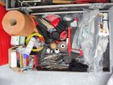 a tool box full of tools and supplies on a table
