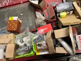 many boxes of assorted items sitting on a table