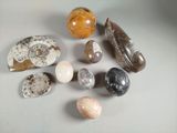 many different types of rocks and stones on the table