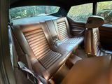 an image of a view of the back seats of a car
