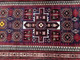 an oriental rug with many different colors and designs on it