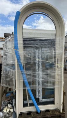 a picture of a window being wrapped up in plastic