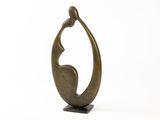 bronze sculpture of a woman holding a bird on a white background