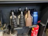 a shelf with a lot of bottles and other items on it