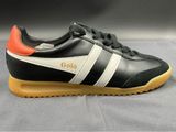 a close up of a pair of black and orange sneakers