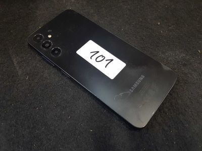 the back of a black samsung phone with a number plate on it