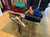 an image of a rack of clothes in a clothing store