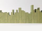 an image of a sculpture of a city made out of green blocks