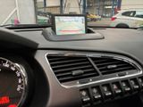 dashboard view of a car with a gps device on the dashboard