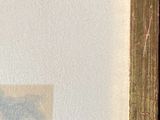 painting of a bird flying over a body of water in a frame