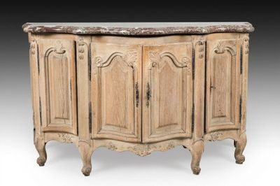an old wooden cabinet with marble top and two doors
