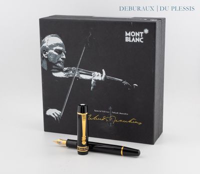 une image représentant un stylo et une boîte sur laquelle figure l'image d'un homme jouant du violon