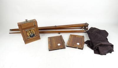 a wooden object that is sitting on a white surface