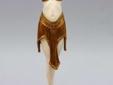 figurine of a woman in a bikini and fringes on a white base