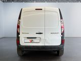 a picture of a white van parked in a garage