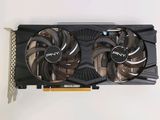 a close up of a video card with a fan on top of it