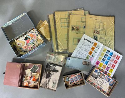 many different types of stamps in a box on the table