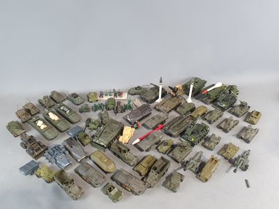 a lot of military vehicles that are on the table