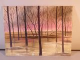 une peinture représentant une peinture d'arbres posée sur une table