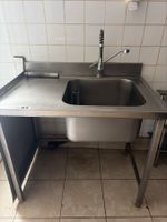 Une plonge en inox un bac avec dosseret.