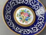 a cup and saucer sitting on a table