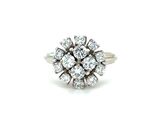 a close up of a diamond ring on a white background