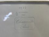 a close up of a white plate with a label on it