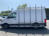 a white van that is parked in a parking lot