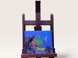 une image représentant un petit chevalet sur lequel est posé un tableau représentant un poisson