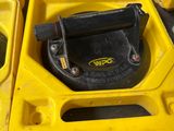 a yellow container with a black handle and a yellow container with a black handle and a yellow container with a black handle and a yellow container with a black