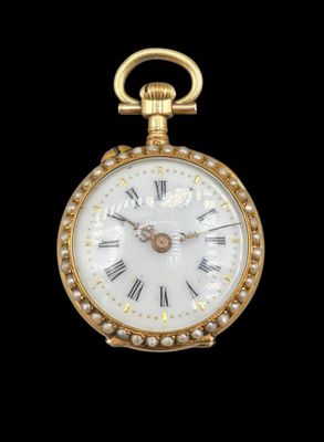 Montre de col en or jaune 750°° de forme circulaire
