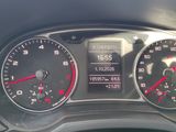 a close up of a car dashboard with a speedometer and gauges