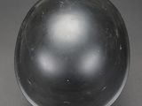an image of a glass ball on a gray surface
