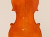 an old violin with a very long neck and a very long back