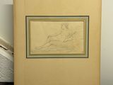 une vieille photo représentant le dessin d'une femme assise par terre