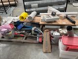a pile of assorted items sitting on a pallet